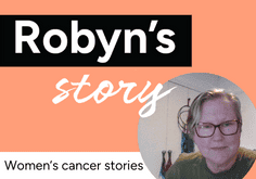 Robyn's story, photo of a woman sitting at her desk looking at her computer.