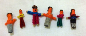 Photo of a row of Guatemalan Worry Dolls