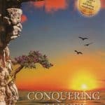 Cover of the book Conquering cancer. Shows sunset over water and three birds flying above the sun.
