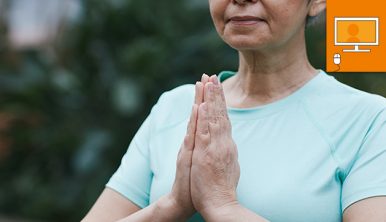 woman with hands in yoga prayer position