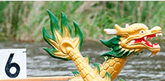 Close up of a golden dragon boat.