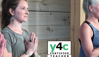 women with hands in prayer position with Yoga4cancer logo
