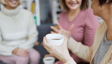 women talking over cup of tea