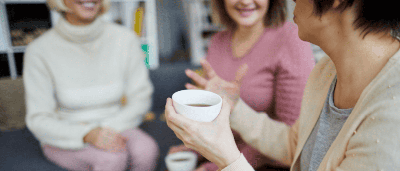 women talking over cup of tea